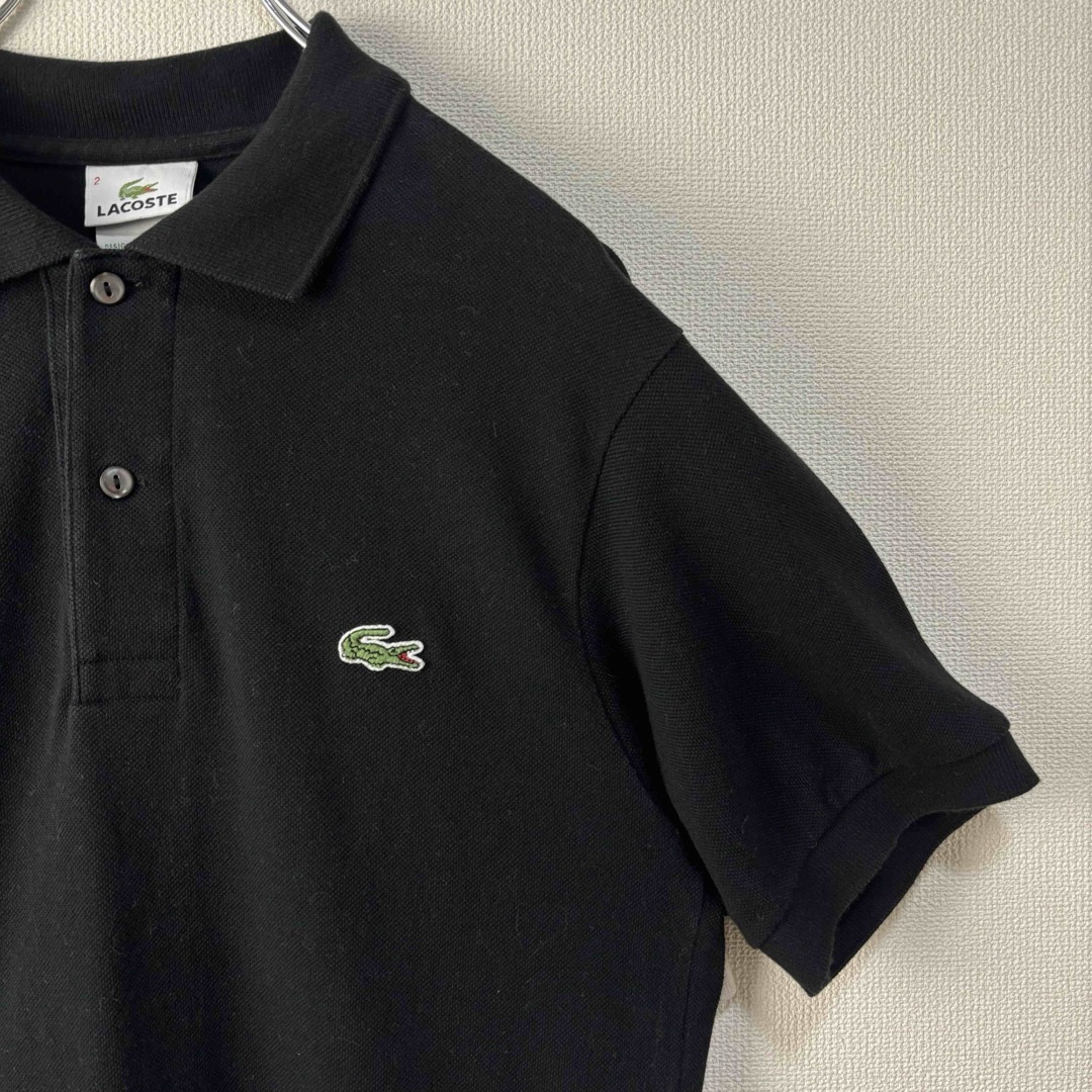 LACOSTE(ラコステ)のLACOSTE ラコステ　ポロシャツ　ブラック　半袖　サイズ2 XS S古着 メンズのトップス(ポロシャツ)の商品写真