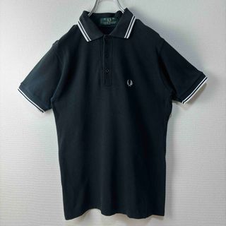 フレッドペリー(FRED PERRY)のフレッドペリー　半袖　ポロシャツ　M12 ビンテージ　黒白　36 S 古着(ポロシャツ)