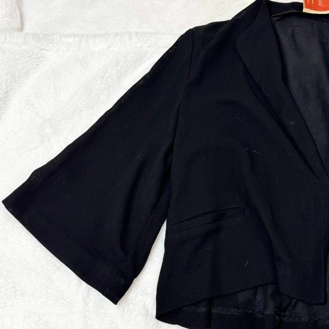 Sybilla(シビラ)の極美品　シビラ　カラミショートジャケット　黒　M  日本製　フレア　シースルー レディースのジャケット/アウター(その他)の商品写真