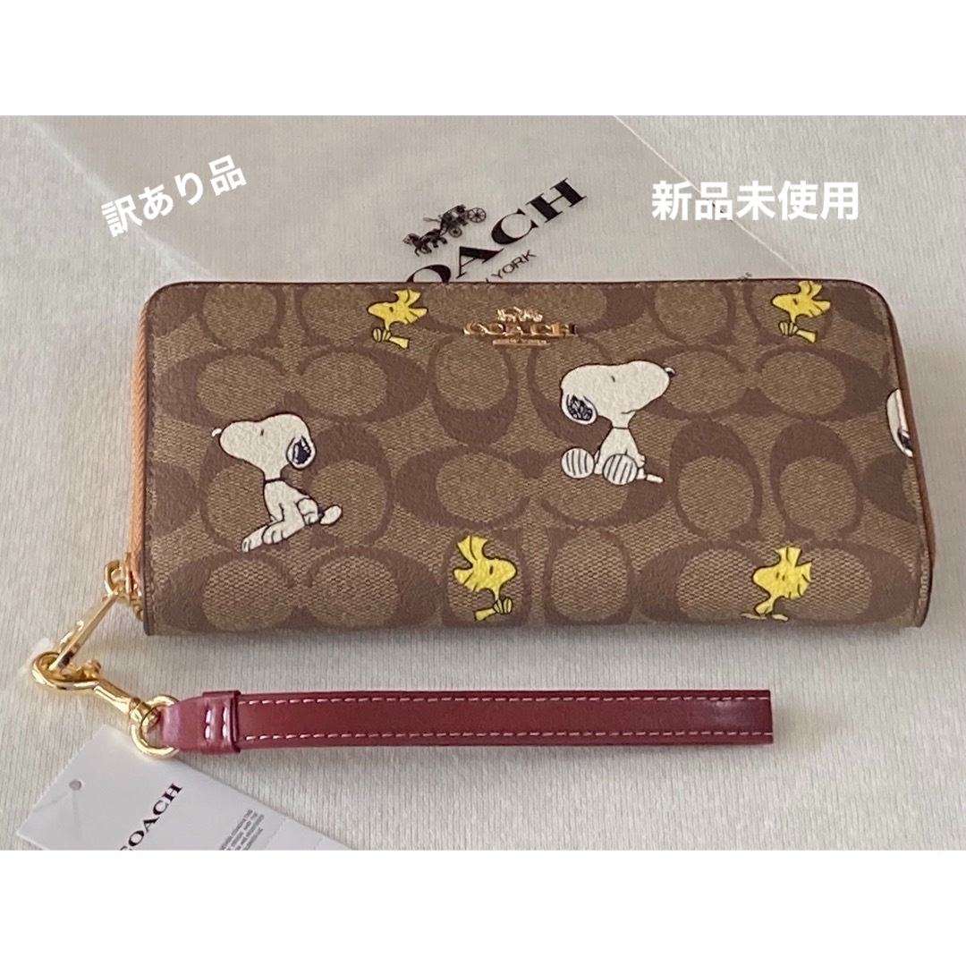 COACH(コーチ)の新品　COACH 長財布　SNOOPY スヌーピー　ウッドストック　シグネチャー レディースのファッション小物(財布)の商品写真