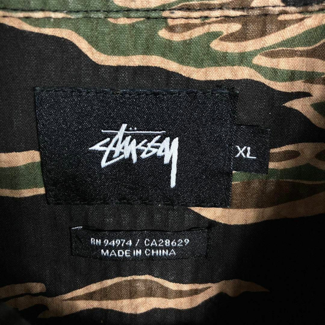 STUSSY(ステューシー)の【希少XLサイズ】ステューシー　半袖シャツ　タイガーカモ柄　総柄　人気モデル メンズのトップス(シャツ)の商品写真