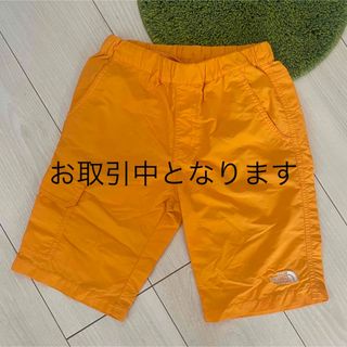 ザノースフェイス(THE NORTH FACE)の美品 ノースフェイス キッズ 130cm ハーフ パンツ オレンジ(パンツ/スパッツ)