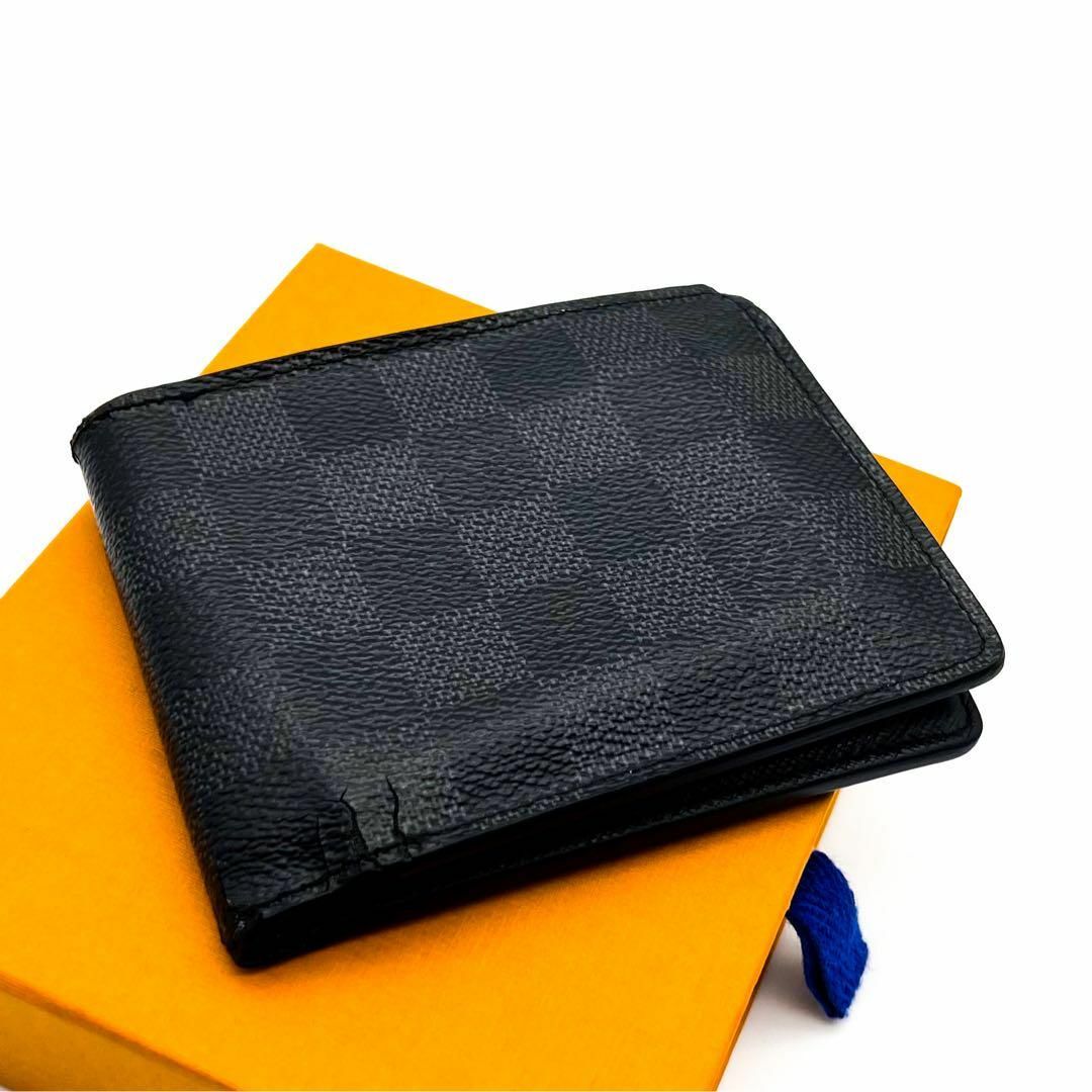 LOUIS VUITTON(ルイヴィトン)のルイヴィトン　ポルトフォイユミュルティプル　ダミエグラフィット　折り財布　黒 メンズのファッション小物(折り財布)の商品写真