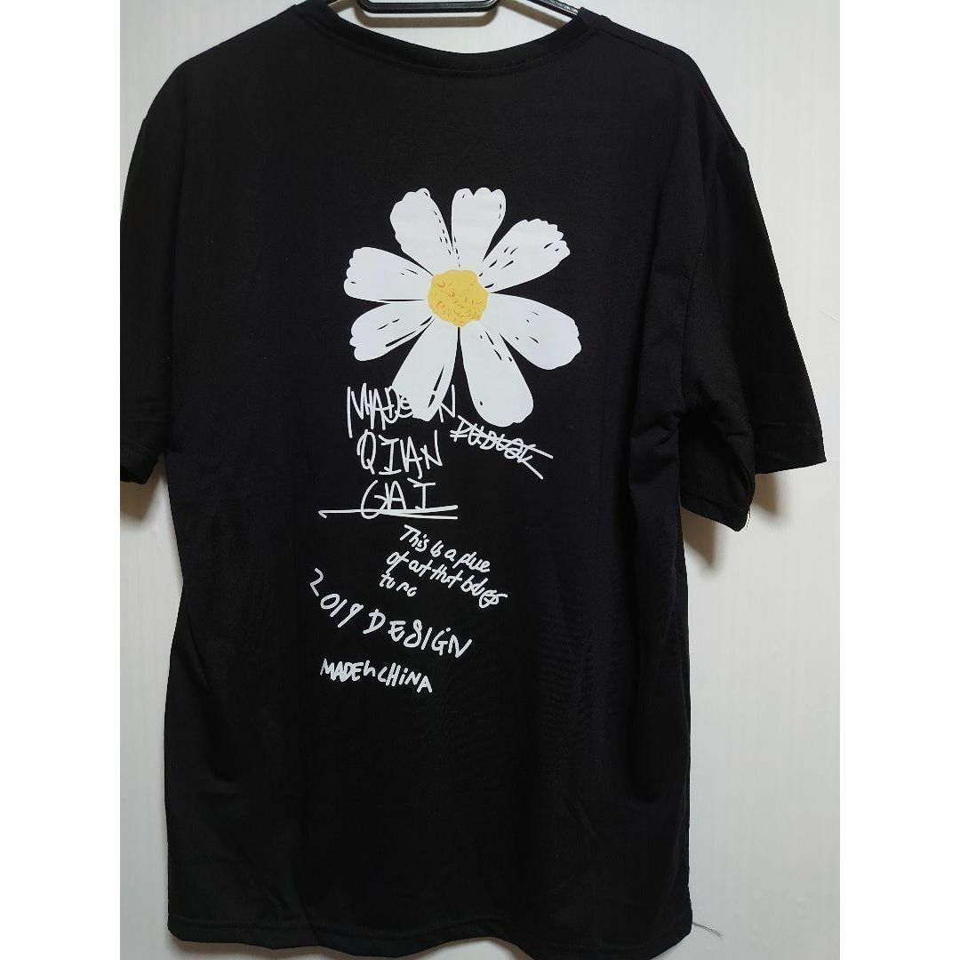 デイジー柄 ブラック 黒 Tシャツ L 花柄  韓国ユニセックス 半袖おしゃれ メンズのトップス(Tシャツ/カットソー(半袖/袖なし))の商品写真