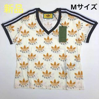 グッチ(Gucci)の☆未使用品☆グッチ × アディダス コラボ  Tシャツ ベージュ M ロゴ(Tシャツ(半袖/袖なし))