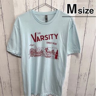 コカコーラ(コカ・コーラ)のUSA古着　Tシャツ　Mサイズ　ライトブルー　水色　ロゴ　プリント　コカコーラ(Tシャツ/カットソー(半袖/袖なし))