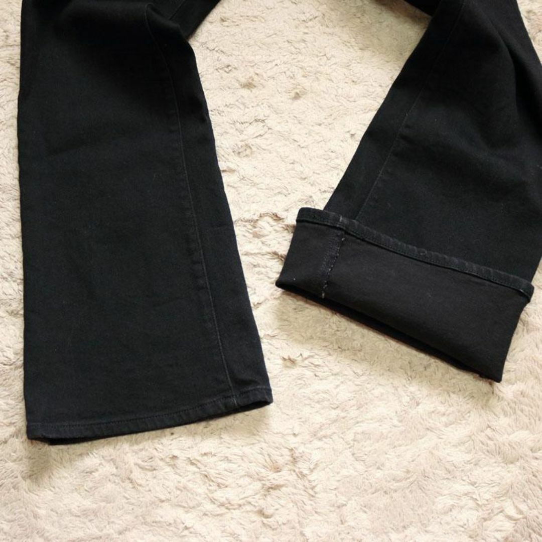 UNIQLO(ユニクロ)のUNIQLO スリムフレアジーンズ 24インチ ブラック レディースのパンツ(デニム/ジーンズ)の商品写真