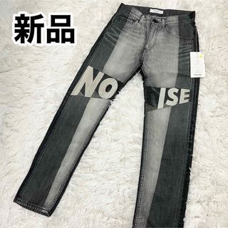 ファセッタズム(FACETASM)の【新品】FACETASM ファセッタズム NOISEロゴプリント デニムパンツ(デニム/ジーンズ)