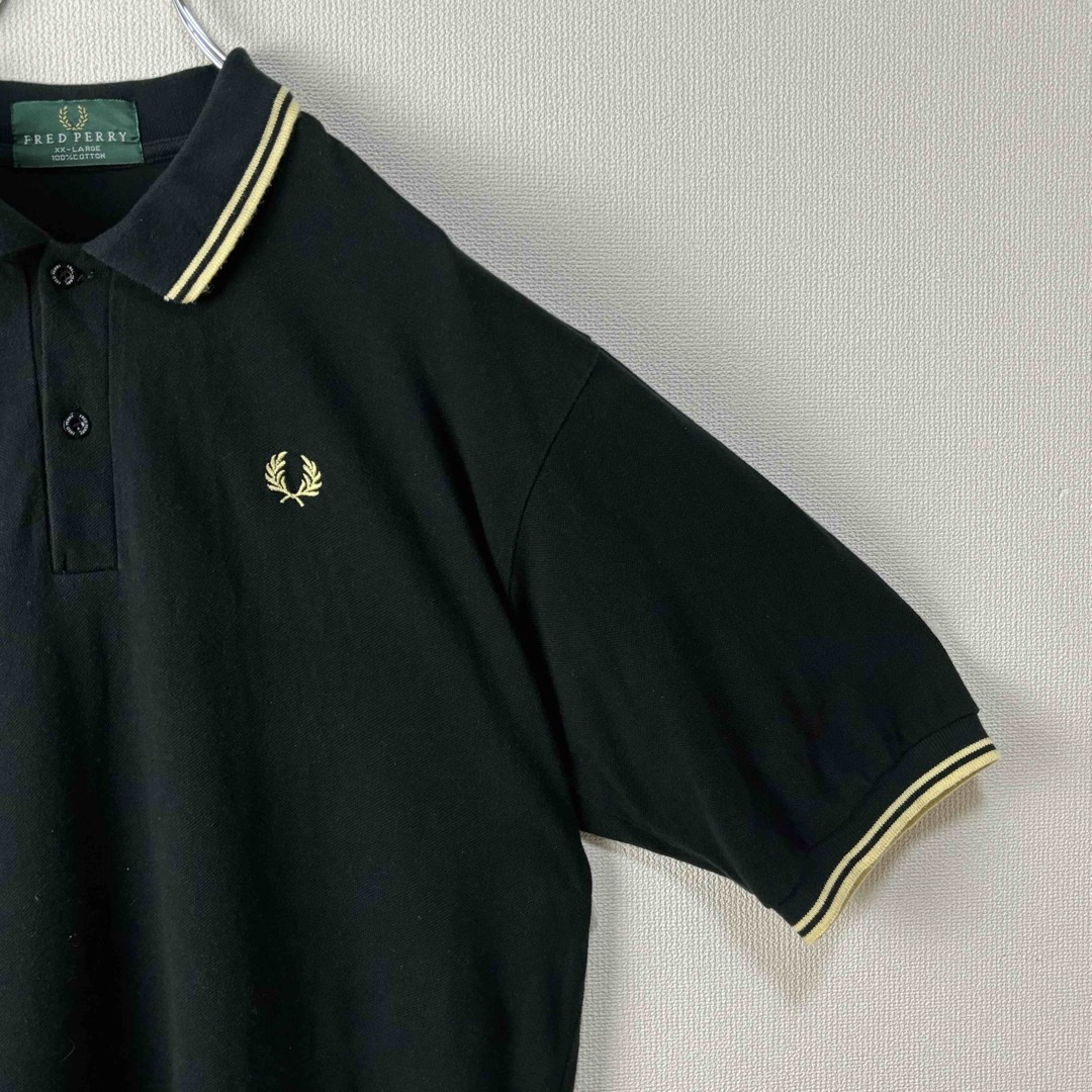 FRED PERRY(フレッドペリー)のフレッドペリー　半袖　ポロシャツ　M12 XXL ブラック　ゴールド　古着 メンズのトップス(ポロシャツ)の商品写真