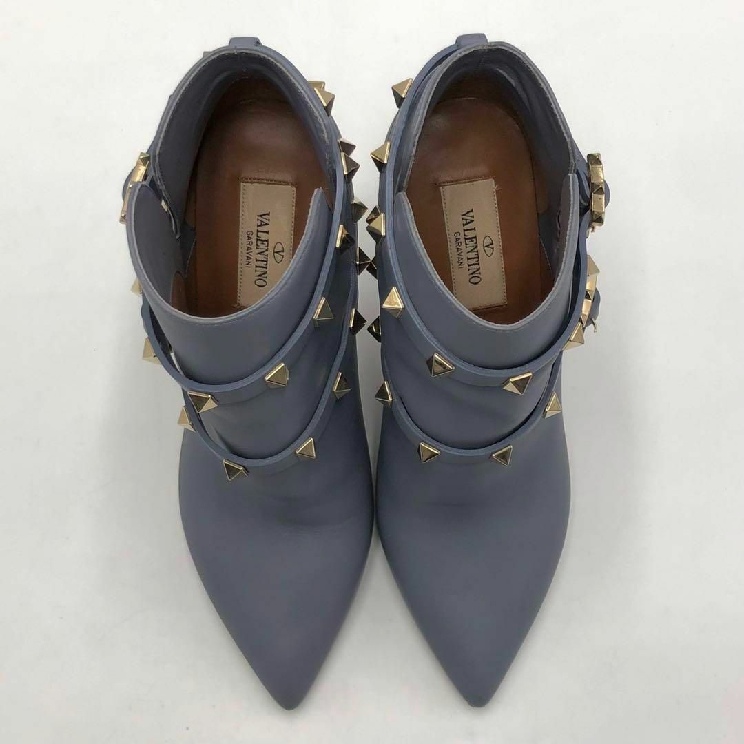 VALENTINO(ヴァレンティノ)の［美品］ヴァレンティノ  ロックスタッズ　ブーティー　ヒール　ベルト付き レディースの靴/シューズ(ブーツ)の商品写真