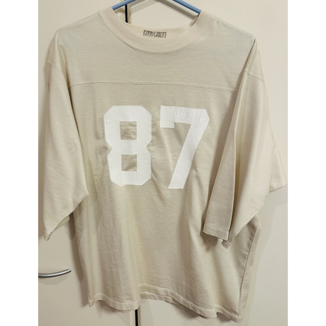 L'Appartement DEUXIEME CLASSE(アパルトモンドゥーズィエムクラス)のGOOD GRIEF!CRACKED PRINT FOOTBALL TEE レディースのトップス(カットソー(長袖/七分))の商品写真