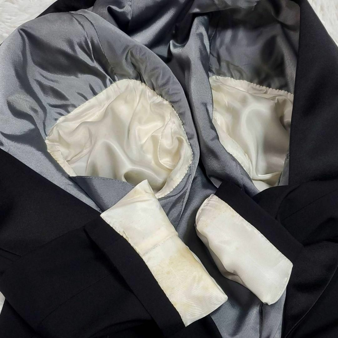 Paul Stuart(ポールスチュアート)の極美品 L ポールスチュアート 羊毛100 タキシード スーツ セットアップ 黒 メンズのスーツ(セットアップ)の商品写真