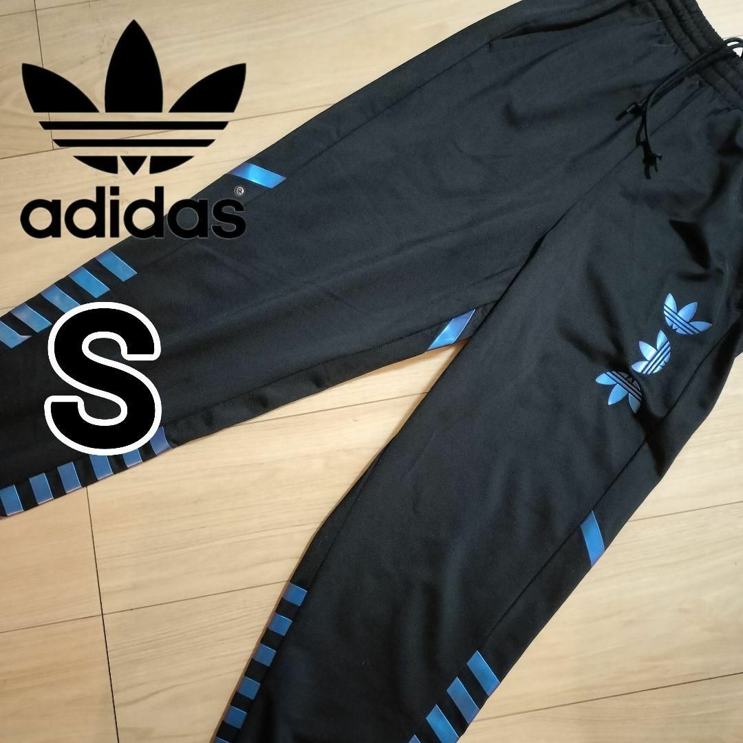 Originals（adidas）(オリジナルス)のアディダス メタリックブルー ZENOトラックパンツ ジャージ 男性S デカロゴ メンズのパンツ(その他)の商品写真