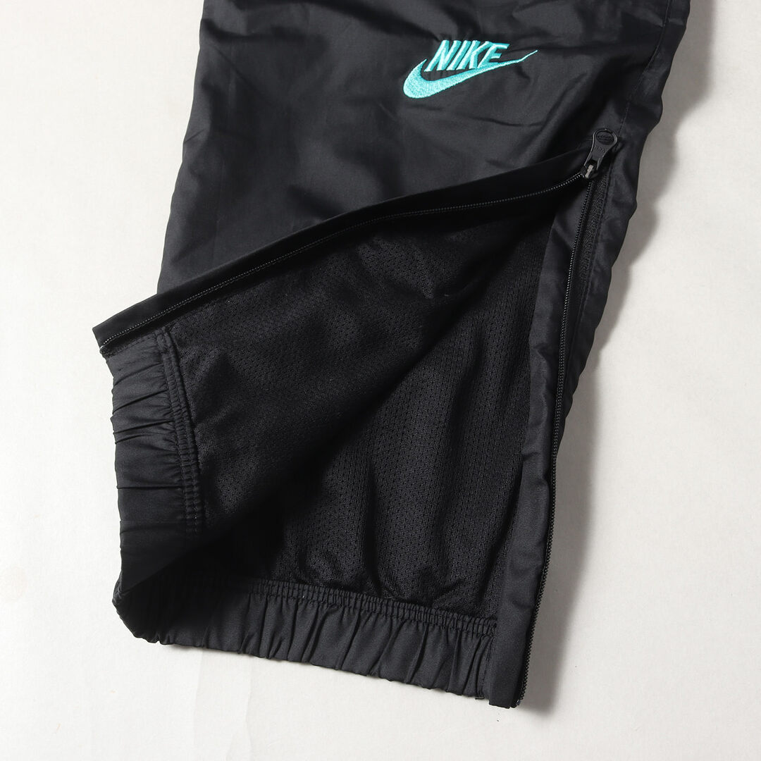 NIKE(ナイキ)のNIKE ナイキ パンツ サイズ:M 19SS ATMOS アトモス 別注 トラックパンツ NRG Vintage Patchwork Track Pant CD6133-011 ブラック 黒 ボトムス ズボン コラボ【メンズ】【中古】【美品】 メンズのパンツ(その他)の商品写真