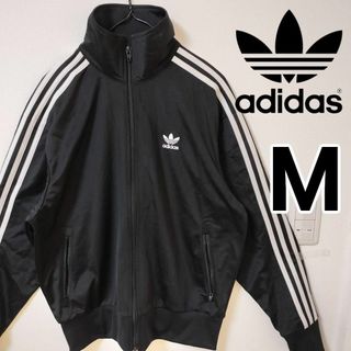 オリジナルス(Originals（adidas）)のアディダス 黒 ファイヤーバード ジャージ ウェア 男性M トラックジャケット(ジャージ)