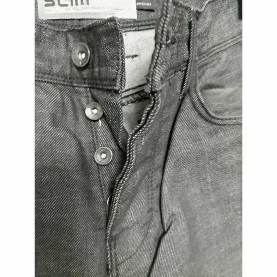 TOPMAN(トップマン)のTOPMAN トップマン ボタンフライ スリムジーンズ デニム 黒 76cm メンズのパンツ(デニム/ジーンズ)の商品写真