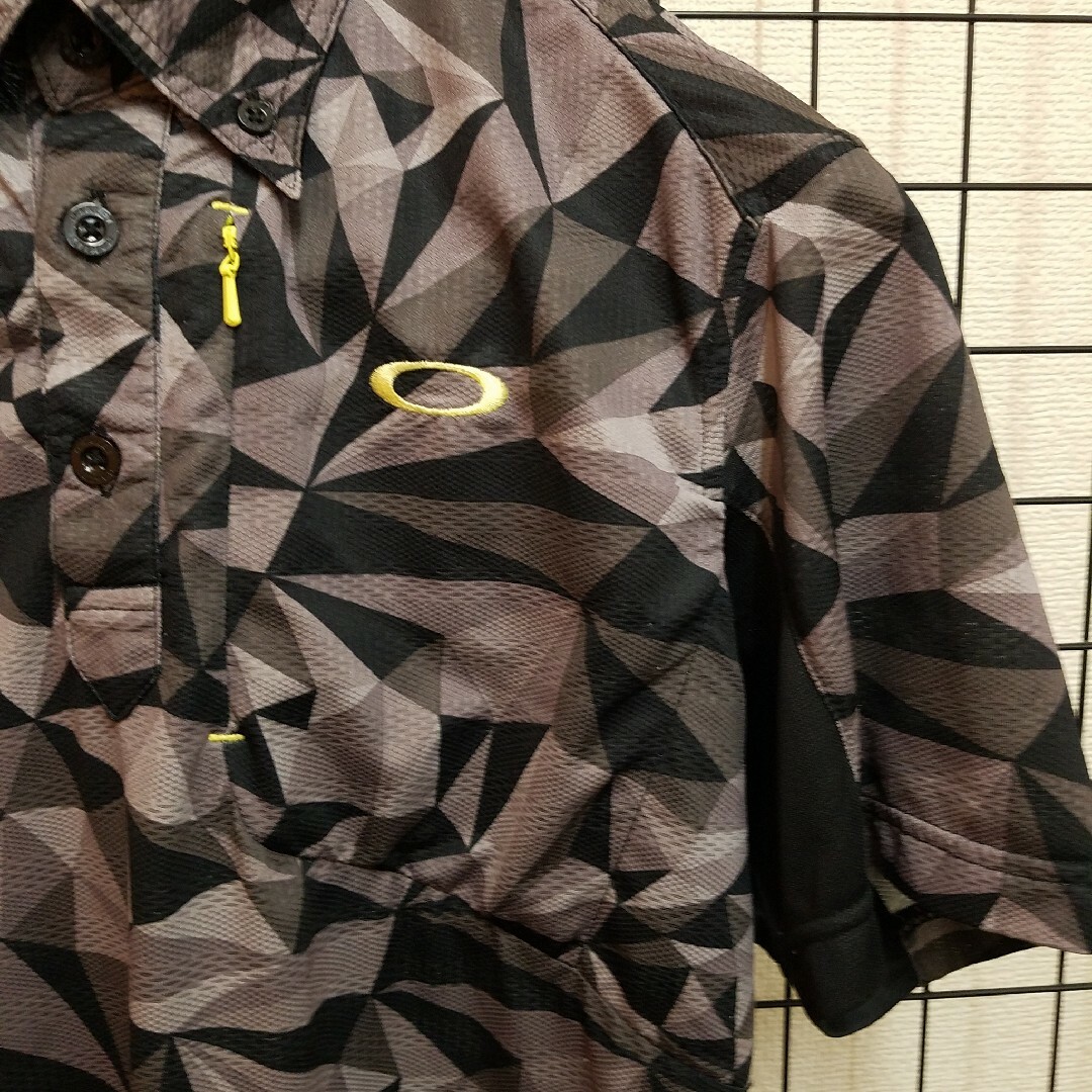 Oakley(オークリー)の15SS OAKLEY Total Pattern S/S Golf Polo スポーツ/アウトドアのゴルフ(ウエア)の商品写真