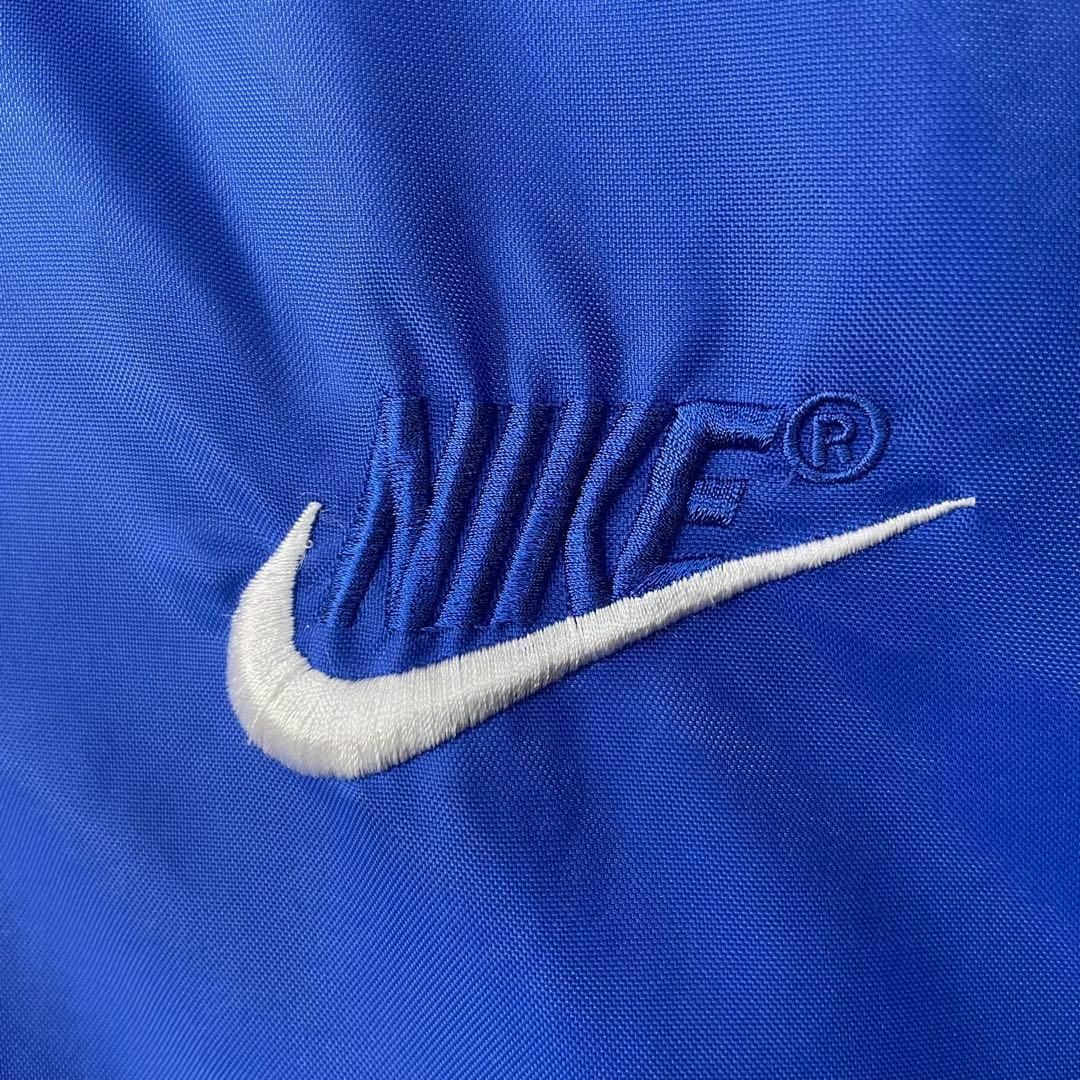 NIKE(ナイキ)の希少 90s NIKE ナイロンジャケット ハーフジップ プルオーバー 青 刺繍 メンズのジャケット/アウター(ナイロンジャケット)の商品写真