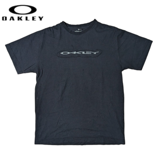 オークリー(Oakley)のOAKLEY ブラック ワッペン 半袖Ｔシャツ(Tシャツ/カットソー(半袖/袖なし))