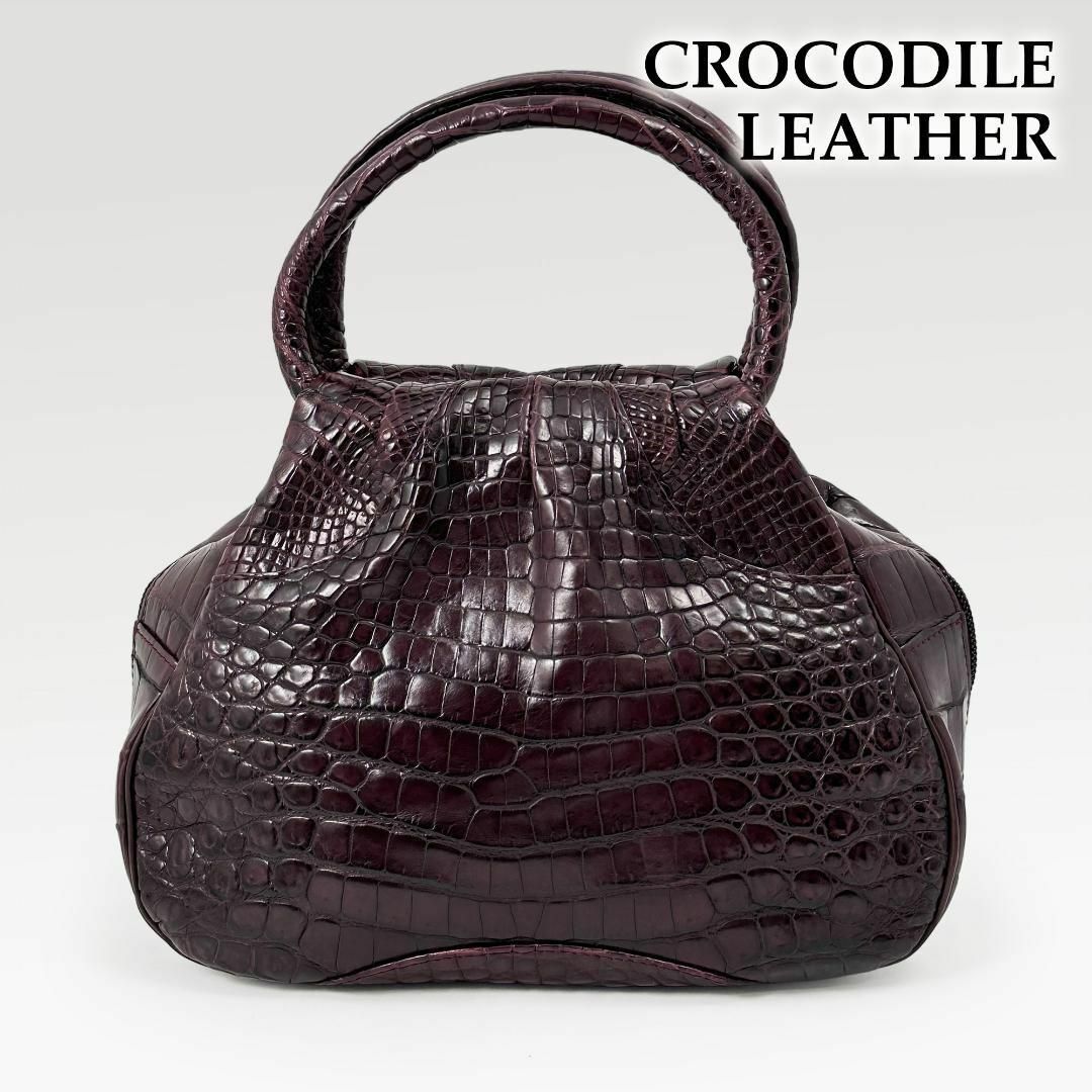 丸いハンドルが可愛い◎クロコダイル ハンドバッグ 赤紫 ボルドー ワニ革◎美品 レディースのバッグ(ハンドバッグ)の商品写真
