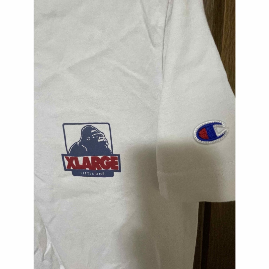 XLARGE KIDS(エクストララージキッズ)のエクストララージキッズ✖︎チャンピオン　Tシャツ キッズ/ベビー/マタニティのキッズ服男の子用(90cm~)(Tシャツ/カットソー)の商品写真