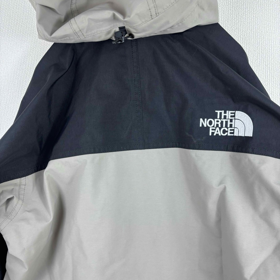 THE NORTH FACE(ザノースフェイス)の新品　ノースフェイス　マウンテンライトジャケット ミネラルグレー　S メンズ メンズのジャケット/アウター(マウンテンパーカー)の商品写真