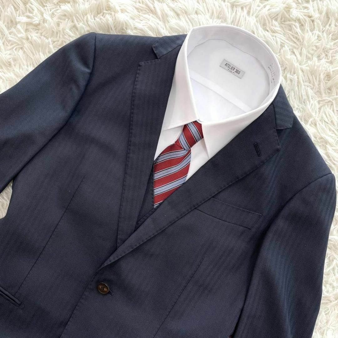 THE SUIT COMPANY(スーツカンパニー)の美品 L スーツカンパニー 3P スーツ セットアップ 紺 リバーシブル ベスト メンズのスーツ(セットアップ)の商品写真