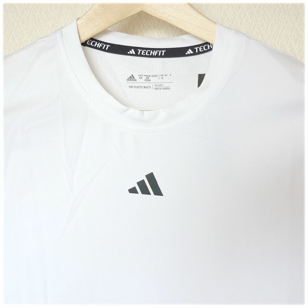 adidas(アディダス)の新品(メンズM)アディダス 白 テックフィット トレーニング長袖Tシャツ/ロンT メンズのトップス(Tシャツ/カットソー(七分/長袖))の商品写真