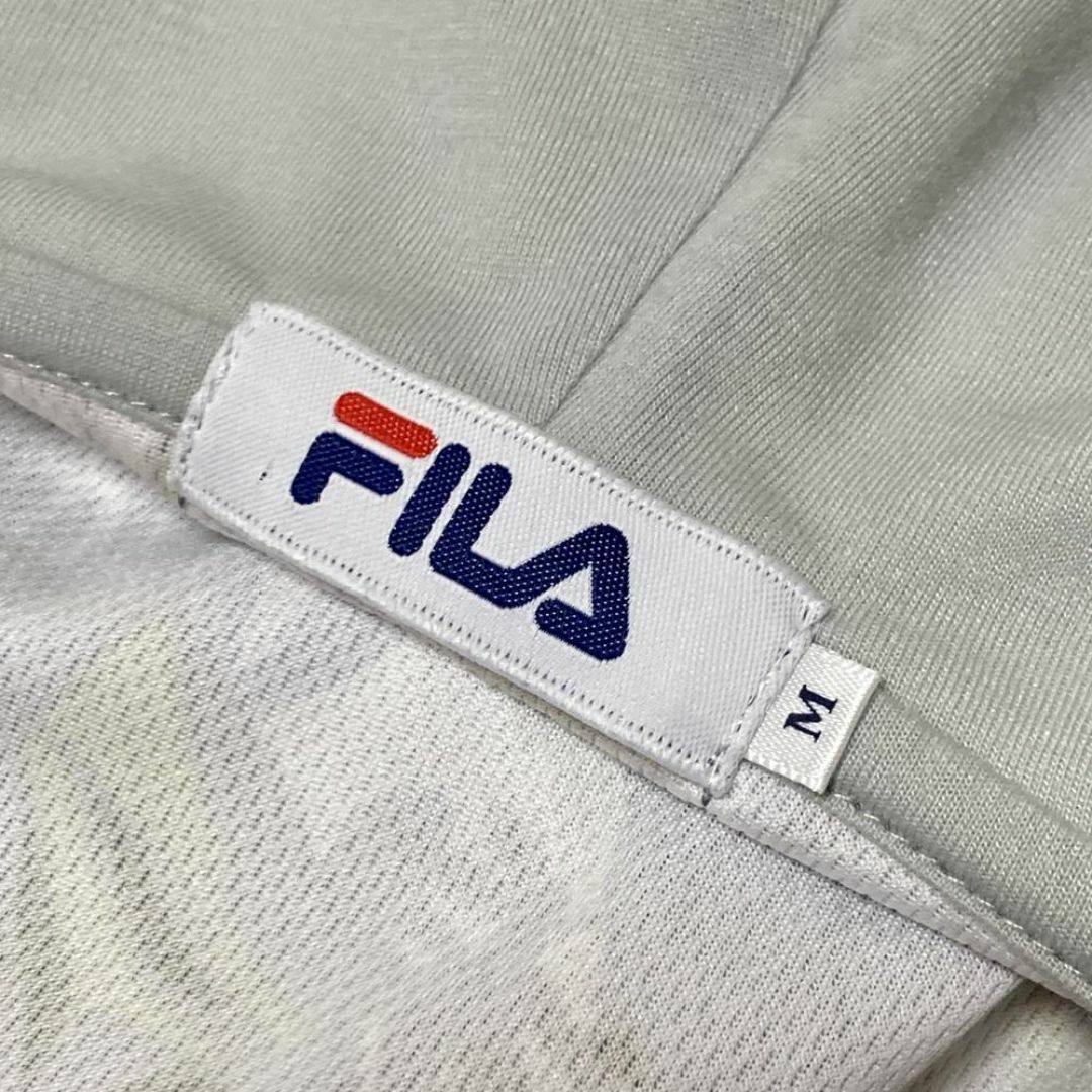 FILA(フィラ)の【人気ウェア】FILA ラッシュガード パーカー ゴルフ 花柄 総柄 ロゴ 刺繍 スポーツ/アウトドアのゴルフ(ウエア)の商品写真