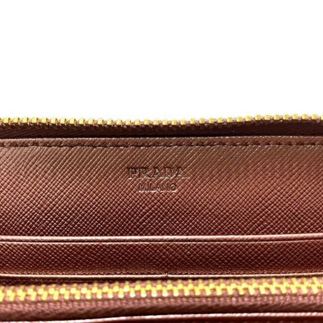 PRADA(プラダ)のプラダ ラウンドファスナー 長財布 メタリック ピンク 財布 サフィアーノ レザー 中古 PRADA ファスナー 小銭入れ有 ロゴ シンプル 定番 人気 レディース レザーウォレット 女性 ロングウォレット 革財布 本革 革 無地 レディースのファッション小物(財布)の商品写真