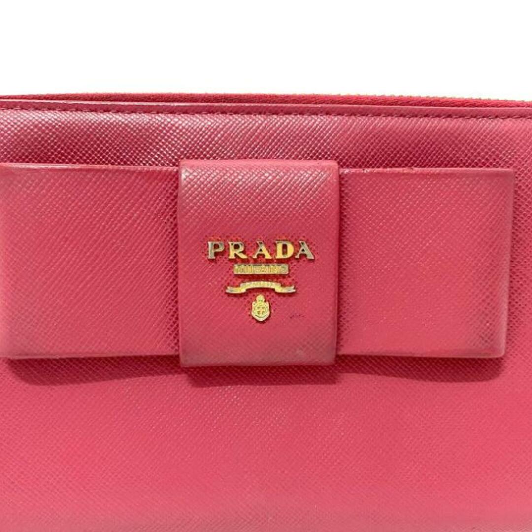 PRADA(プラダ)のプラダ ラウンドファスナー 長財布 ピンク 1M0506 財布 レザー サフィアーノ 中古 PRADA ファスナー リボン 小銭入れ有 定番 人気 レディース レザーウォレット ウォレット 女性 革財布 本革 革 ゴールド金具 無地 レディースのファッション小物(財布)の商品写真