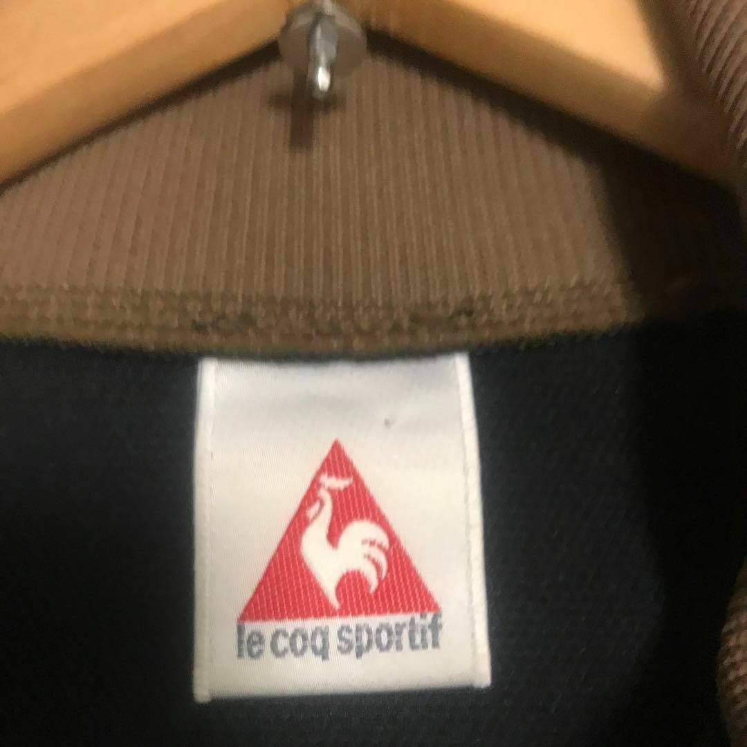 le coq sportif(ルコックスポルティフ)のルコックスポルティフ　トラックジャケット　フランスロゴ　ブラックブラウン　y2k メンズのトップス(ジャージ)の商品写真