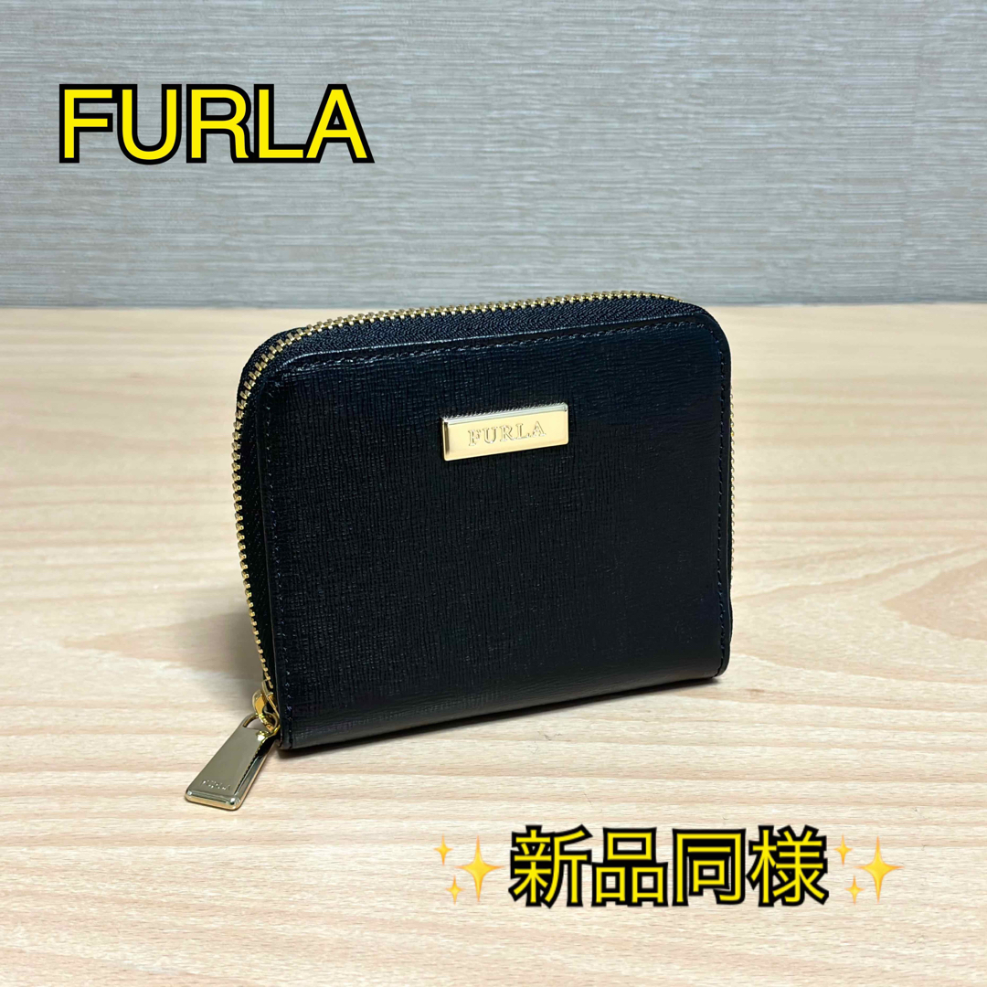 Furla(フルラ)の新品同様✨FURLA フルラ レザー ロゴプレート ラウンドジップ 二つ折り財布 レディースのファッション小物(財布)の商品写真