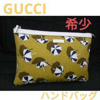 グッチ(Gucci)のグッチキャンバス パラソル クラッチバッグ マルチケース ポーチ(クラッチバッグ)