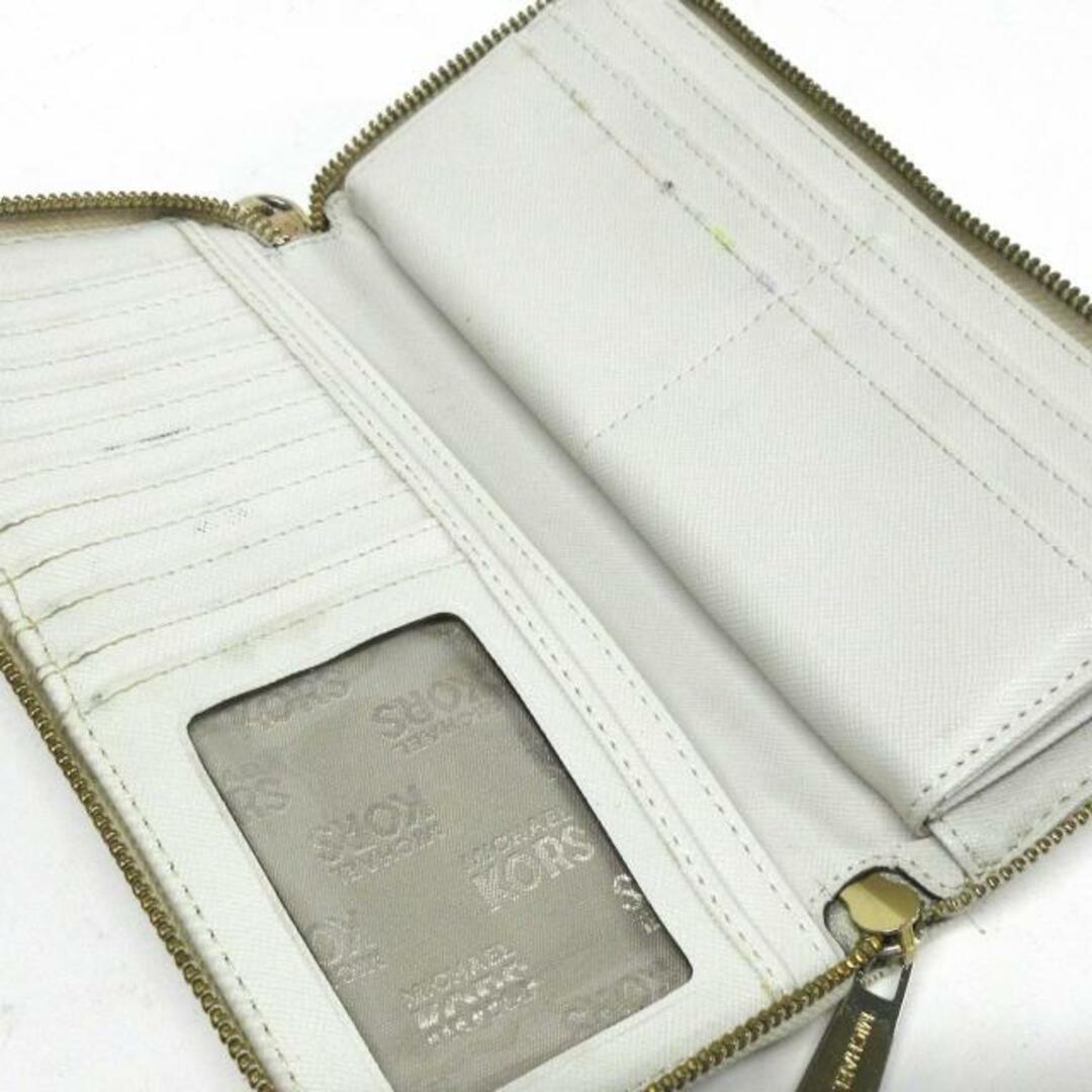 Michael Kors(マイケルコース)のMICHAEL KORS(マイケルコース) 長財布 - アイボリー×ブラウン ラウンドファスナー PVC(塩化ビニール) レディースのファッション小物(財布)の商品写真
