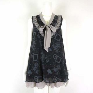 アクシーズファム(axes femme)のアクシーズファム メルヘン柄 ボウタイ チュニック ブラウス フレア M 美品(チュニック)