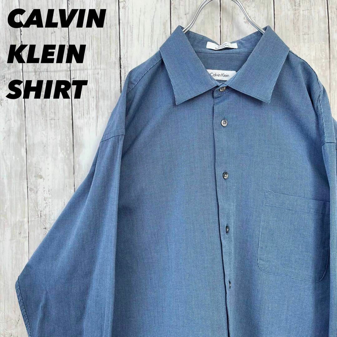 Calvin Klein(カルバンクライン)のアメリカ古着　CALVIN KLEIN カルバンクライン　長袖シャツ　XLブルー メンズのトップス(シャツ)の商品写真