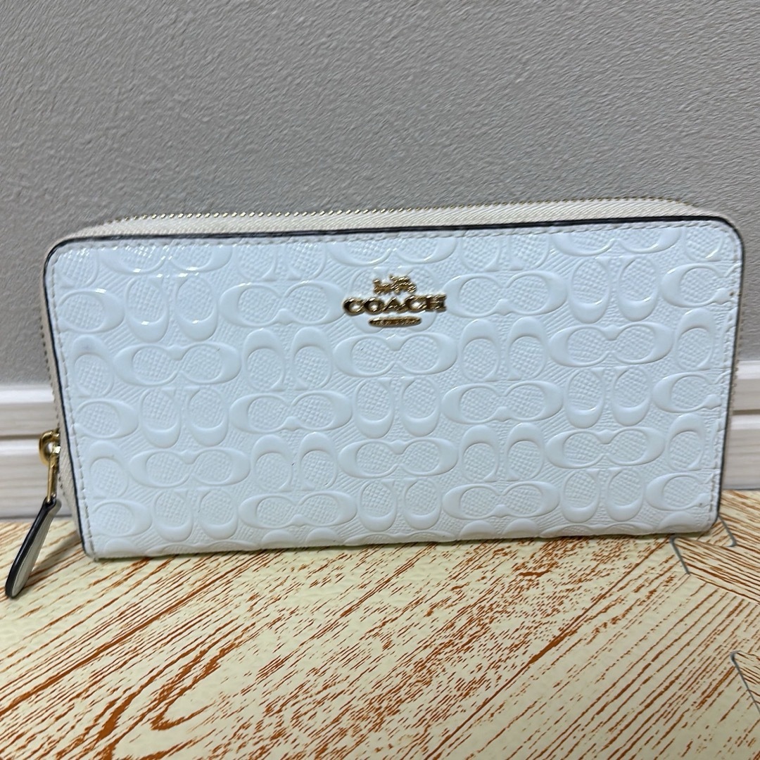 COACH - COACH コーチ 長財布 エンボス シグネチャー 白 の通販 COACH - COACH コーチ 長財布 エンボス シグネチャー 白 の通販