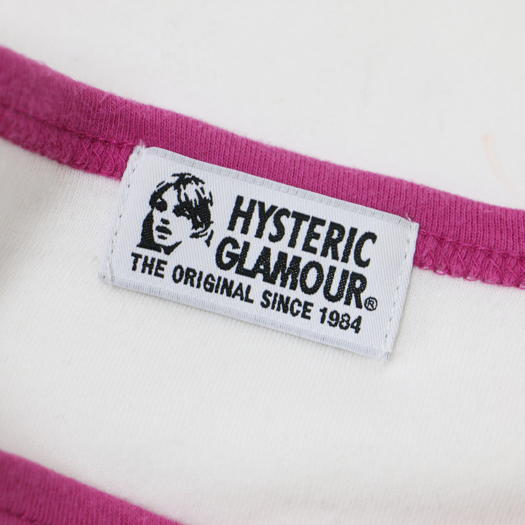 HYSTERIC GLAMOUR(ヒステリックグラマー)のHYSTERIC GLAMOUR ヒステリックグラマー Tシャツ トップス ホワイト ピンク 白 FREE 7分袖 ラウンドネック パイピング グラフィック ロゴ プリント SKRRRSKRR おしゃれ シンプル きれいめ ブランド カジュアル ガーリー 着回し 【レディース】【中古】 レディースのトップス(Tシャツ(長袖/七分))の商品写真