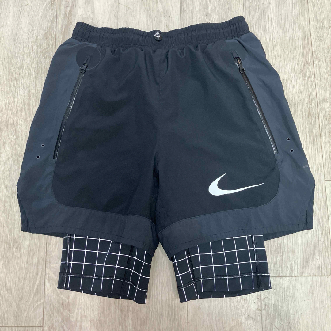 OFF-WHITE(オフホワイト)のOFF-WHITE Nike  Shorts Grid オフホワイト ナイキ メンズのパンツ(ショートパンツ)の商品写真