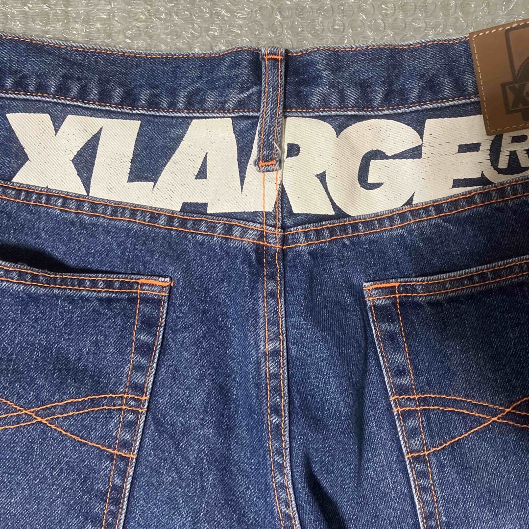 XLARGE(エクストララージ)のXLARGE ネオンステッチデニムパンツ メンズのパンツ(デニム/ジーンズ)の商品写真