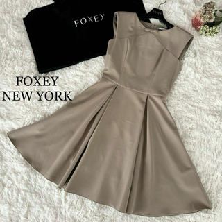 フォクシーニューヨーク(FOXEY NEW YORK)の美品 FOXEY NEW YORK フロントリボンドレス ベージュ 38(ひざ丈ワンピース)