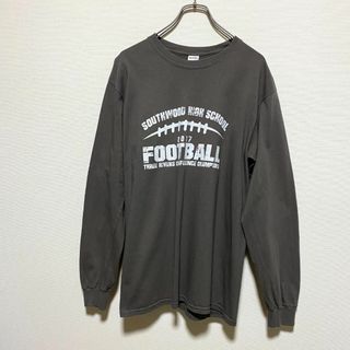 ギルタン(GILDAN)のアメリカ古着　サウスウッド高校　スクールTシャツ　長袖Tシャツ　ロンT　アメフト(Tシャツ/カットソー(七分/長袖))