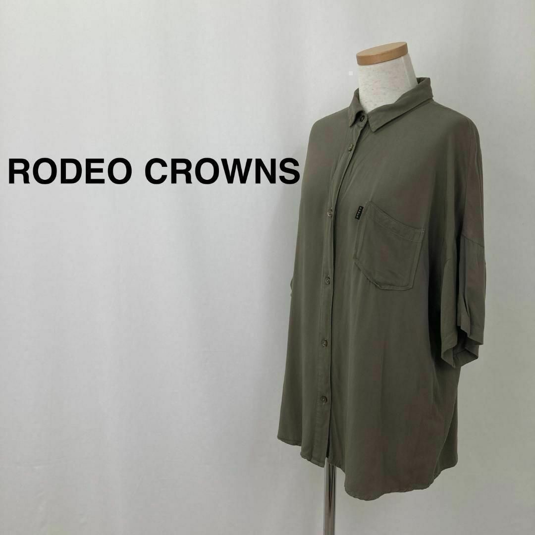 RODEO CROWNS WIDE BOWL(ロデオクラウンズワイドボウル)のロデオクラウン Back letter シャツ カーキ レディース レディースのトップス(シャツ/ブラウス(長袖/七分))の商品写真