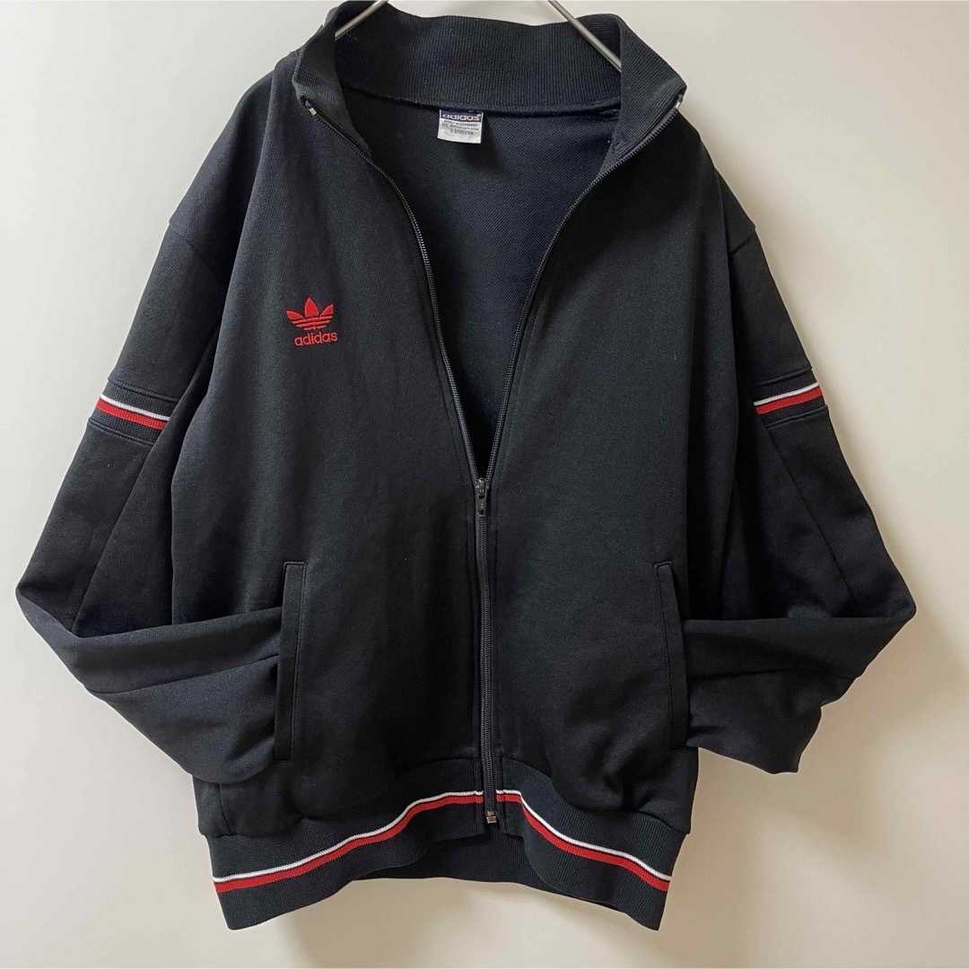 adidas(アディダス)の70s美品】アディダス刺繍トラックジャケット古着ジャージ　ビンテージ黒ブラック赤 メンズのトップス(ジャージ)の商品写真