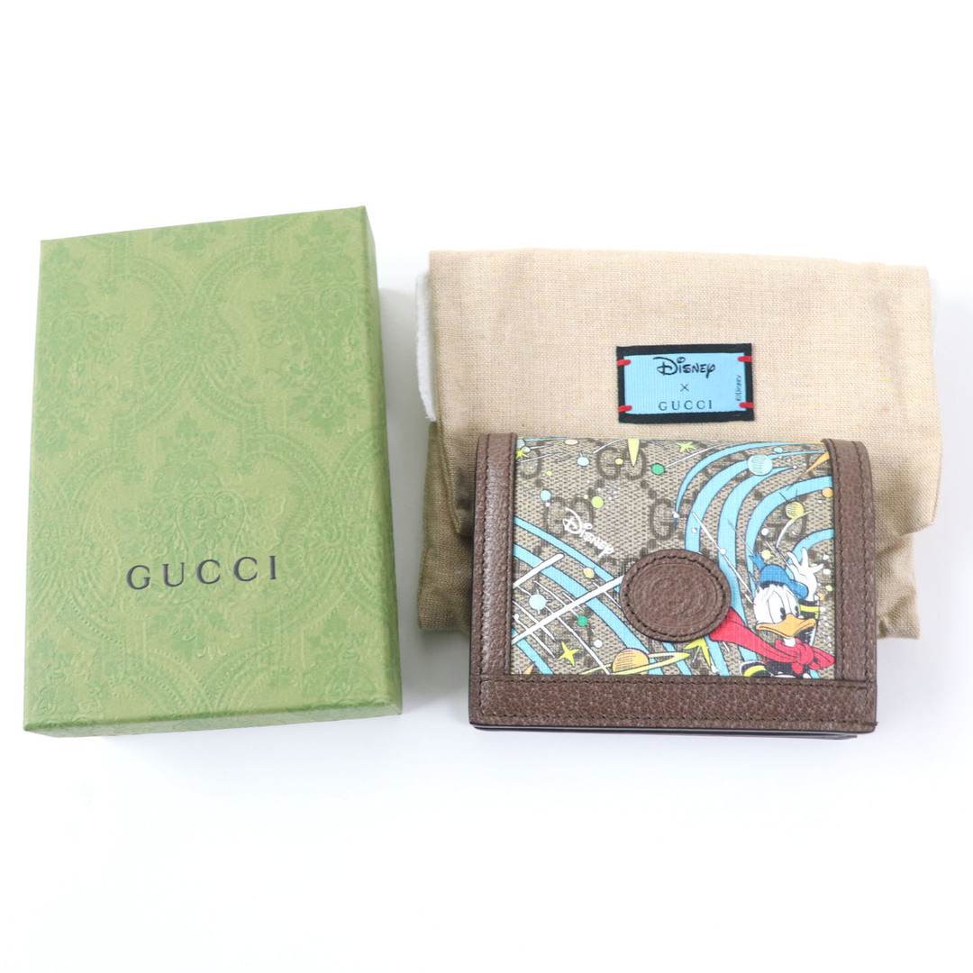 Gucci(グッチ)の未使用品☆GUCCI グッチ DISNEY ディズニー 648121 GGスプリームキャンバス ドナルドダック 二つ折り財布 マルチカラー 箱・保存袋付き イタリア製 レディース レディースのファッション小物(財布)の商品写真