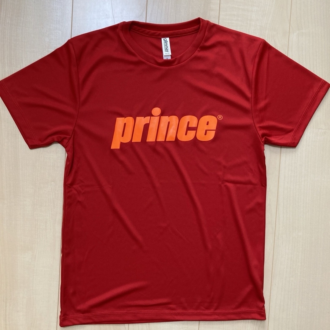 Prince(プリンス)の未使用品　prince キャンペーンTシャツ　Sサイズ　赤　プリンス スポーツ/アウトドアのテニス(ウェア)の商品写真