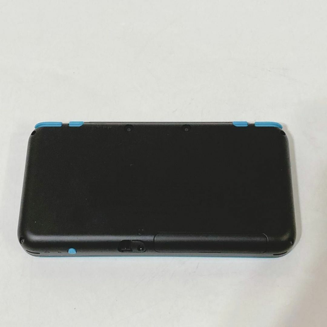 ニンテンドー2DS(ニンテンドー2DS)の超美品 Newニンテンドー2DS LL ブラック×ターコイズ 任天堂 エンタメ/ホビーのゲームソフト/ゲーム機本体(携帯用ゲーム機本体)の商品写真