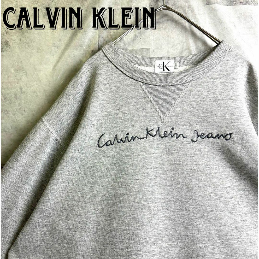 Calvin Klein(カルバンクライン)の希少 美品 カルバンクライン スウェット 筆記体 刺繍センターロゴ グレー M メンズのトップス(スウェット)の商品写真