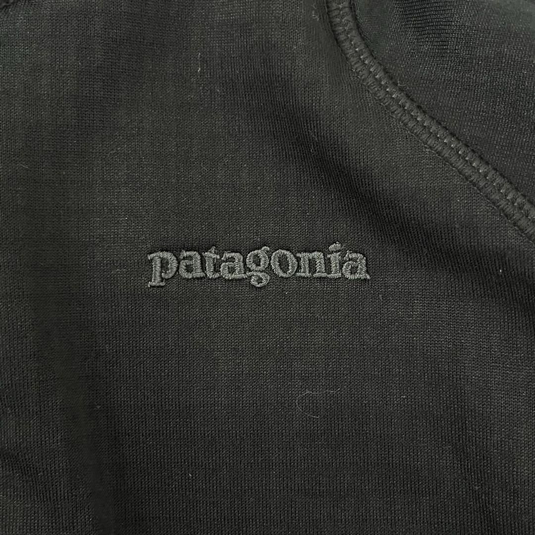 patagonia(パタゴニア)のPatagonia レギュレーター R1 トップス メンズ M ブラック ロゴ メンズのジャケット/アウター(その他)の商品写真